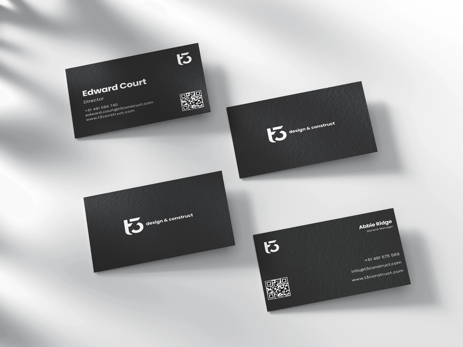 T3 Design & Construct business card mockups for Director Edward Court and General Manager Abbie Ridge